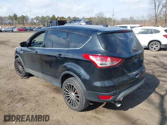 2014 Ford Escape SE with VIN 1FMCU9GXXEUA57133, listed as a IAAI auction lot 41642184 with 1 mi miles. Bid and sale history available at carsss.com. Image 3.