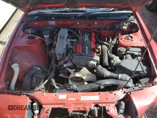 1989 Nissan 240SX z VIN RS13604765, wystawiony jako Copart lot #46514985 z przebiegiem 115 929 mil mil oraz Szkody całkowita. Historia ofert i sprzedaży dostępna na DreamBid. Obrazek 11.