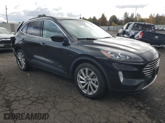2021 Ford Escape Titanium with VIN 1FMCU9J98MUA73257, listed as a Copart auction lot 74838394 with 41,294 mi miles and Salvage Title. Bid and sale history available at carsss.com. Image 4.