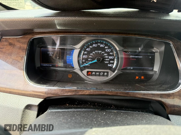 2014 Ford Taurus Limited with VIN 1FAHP2F84EG141388, listed as a Copart auction lot 61052645 with 112,876 mi miles and Clean title. Bid and sale history available at DreamBid. Image 8.