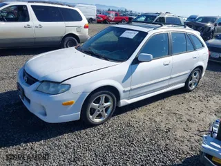 2002 Mazda Protege5 with VIN JM1BJ245021531543, listed as a IAAI auction lot 41660970 with 172,200 mi miles. Bid and sale history available at carsss.com. Image 2.
