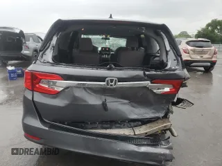 2018 Honda Odyssey EX with VIN 5FNRL6H50JB047999, listed as a Copart auction lot 57819495 with 121,295 mi miles and Salvage title. Bid and sale history available at DreamBid. Image 6.