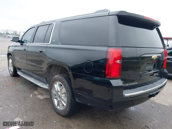 2015 Chevrolet Suburban LTZ with VIN 1GNSCKKC6FR271675, listed as a IAAI auction lot 41915036 with 150,917 mi miles. Bid and sale history available at carsss.com. Image 3.