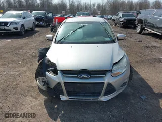 2013 Ford Focus SE with VIN 1FADP3F20DL174037, listed as a IAAI auction lot 41792552 with 131,984 mi miles. Bid and sale history available at carsss.com. Image 12.