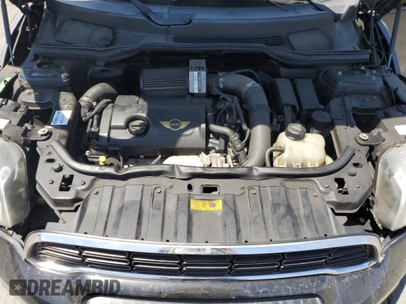 2013 MINI Countryman S ALL4 with VIN WMWZC5C52DWP30625, listed as a Copart auction lot 62772395 with 129,498 mi miles and Salvage title. Bid and sale history available at DreamBid. Image 11.