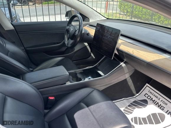 2018 Tesla Model 3 Long Range Battery with VIN 5YJ3E1EB0JF117496, listed as a Copart auction lot 51468855 with 101,156 mi miles and Clean Title. Bid and sale history available at carsss.com. Image 5.