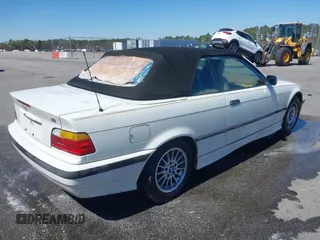 1996 BMW 3-Series 328IC with VIN WBABK8324TET92418, listed as a IAAI auction lot 41815664 with 128,661 mi miles. Bid and sale history available at carsss.com. Image 4.