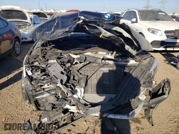 2020 BMW 7 Series 740i xDrive with VIN WBA7T4C02LCD07519, listed as a Copart auction lot 74927454 with Not provided miles and Salvage title. Bid and sale history available at DreamBid. Image 5.