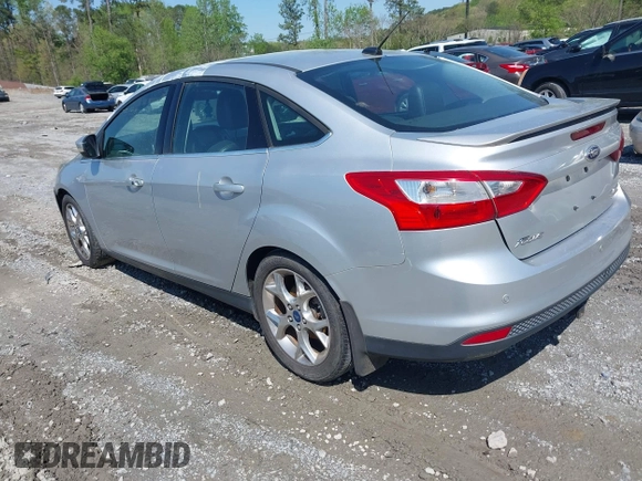 2014 Ford Focus Titanium with VIN 1FADP3J27EL227261, listed as a IAAI auction lot 41972536 with 172,470 mi miles. Bid and sale history available at carsss.com. Image 3.