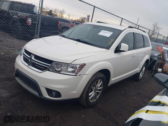 2014 Dodge Journey SXT with VIN 3C4PDCBB8ET153190, listed as a IAAI auction lot 41854655 with 153,048 mi miles and . Bid and sale history available at DreamBid. Image 17.