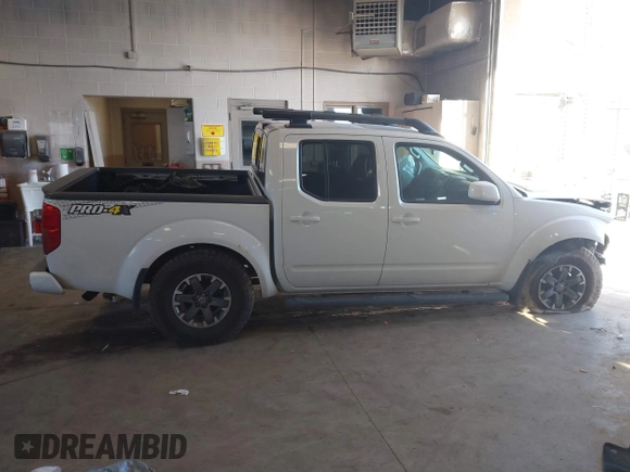 2014 Nissan Frontier SV with VIN 1N6AD0EV4EN736220, listed as a IAAI auction lot 41241823 with 91,789 mi miles and . Bid and sale history available at DreamBid. Image 13.
