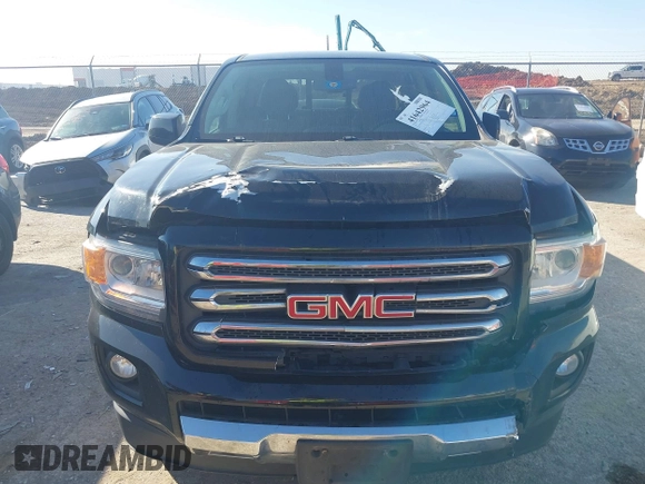 2016 GMC Canyon 4WD SLE with VIN 1GTG6CE30G1381435, listed as a IAAI auction lot 41642964 with 130,490 mi miles. Bid and sale history available at carsss.com. Image 6.
