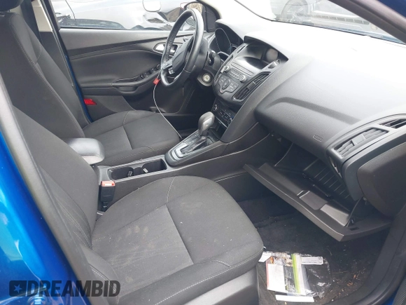 2018 Ford Focus SE z VIN 1FADP3F25JL255840, wystawiony jako IAAI lot #41852913 z przebiegiem 64 010 mil mil oraz . Historia ofert i sprzedaży dostępna na DreamBid. Obrazek 5.