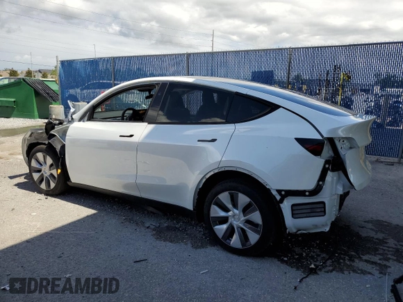 2024 Tesla Model Y Long Range with VIN 7SAYGDEEXRA288960, listed as a Copart auction lot 60801525 with 18,942 mi miles and Salvage title. Bid and sale history available at DreamBid. Image 2.
