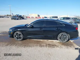 2022 Kia K5 GT-Line z VIN 5XXG64J2XNG139790, wystawiony jako IAAI lot #41737680 z przebiegiem 34 738 mil mil oraz . Historia ofert i sprzedaży dostępna na DreamBid. Obrazek 14.