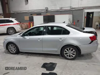 2014 Volkswagen Jetta Sedan SE w/Connectivity/Sunroof PZEV with VIN 3VWD17AJ9EM437804, listed as a IAAI auction lot 42026842 with 83,114 mi miles. Bid and sale history available at carsss.com. Image 14.