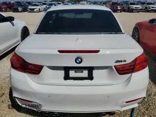 2015 BMW M4 with VIN WBS3U9C56FP968142, listed as a Copart auction lot 74034884 with Not Provided miles and Salvage Title. Bid and sale history available at carsss.com. Image 6.