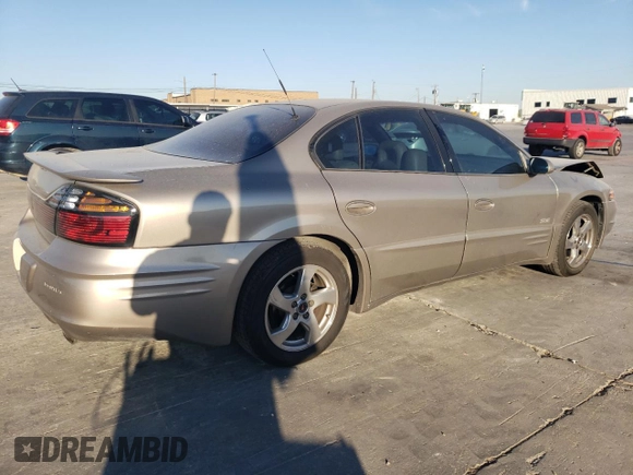 2002 Pontiac Bonneville SLE z VIN 1G2HY54K424205499, wystawiony jako Copart lot #76815334 z przebiegiem 84 715 mil mil oraz Szkoda całkowita • Salvage title. Historia ofert i sprzedaży dostępna na DreamBid. Obrazek 3.