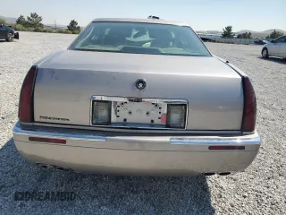 1996 Cadillac Eldorado z VIN 1G6EL12Y3TU618242, wystawiony jako Copart lot #70318844 z przebiegiem Nie podano mil oraz Szkody całkowita. Historia ofert i sprzedaży dostępna na DreamBid. Obrazek 6.