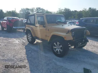 2013 Jeep Wrangler Arctic z VIN 1C4GJWBG2DL634942, wystawiony jako IAAI lot #42373239 z przebiegiem 131 470 mil mil oraz . Historia ofert i sprzedaży dostępna na DreamBid. Obrazek 1.