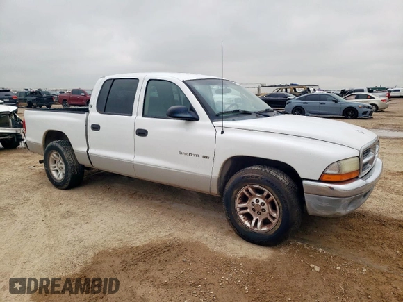 2001 Dodge Dakota Sport z VIN 1B7GL2AN51S118157, wystawiony jako Copart lot #58797325 z przebiegiem 147 765 mil mil oraz Szkoda całkowita • Salvage title. Historia ofert i sprzedaży dostępna na DreamBid. Obrazek 4.