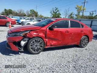2023 Kia Forte GT with VIN 3KPF44AC5PE675990, listed as a Copart auction lot 48951755 with 24,299 mi miles and Non Repairable. Bid and sale history available at carsss.com. Image 1.