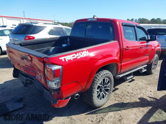2023 Toyota Tacoma 4WD SR with VIN 3TMCZ5AN1PM613455, listed as a IAAI auction lot 41770990 with 12,643 mi miles. Bid and sale history available at carsss.com. Image 4.