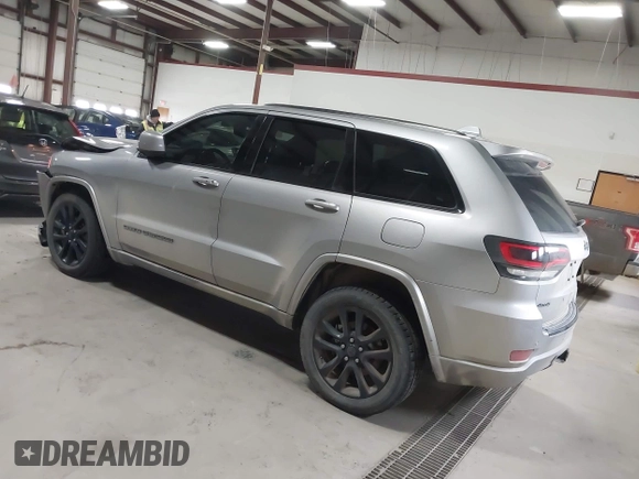 2018 Jeep Grand Cherokee Laredo E with VIN 1C4RJFAG6JC102969, listed as a IAAI auction lot 41963137 with 112,361 mi miles and . Bid and sale history available at DreamBid. Image 3.