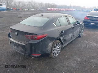 2022 Mazda 3 Premium with VIN 3MZBPADL7NM316513, listed as a IAAI auction lot 41347291 with 47,351 mi miles and . Bid and sale history available at DreamBid. Image 4.