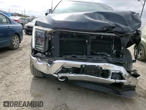 2021 Ford F-150 XL with VIN 1FTFW1E83MFB66545, listed as a Copart auction lot 49702825 with 84,078 mi miles and Salvage title. Bid and sale history available at DreamBid. Image 11.