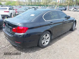 2013 BMW 5 Series 528i xDrive with VIN WBAXH5C55DDW15974, listed as a IAAI auction lot 42185094 with Not provided miles and . Bid and sale history available at DreamBid. Image 4.