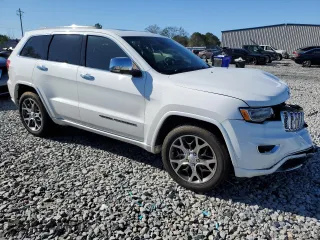 2019 Jeep Grand Cherokee Overland with VIN 1C4RJECG2KC543474, listed as a Copart auction lot 87354084 with 86,076 mi miles and Salvage Title. Bid and sale history available at carsss.com. Image 4.