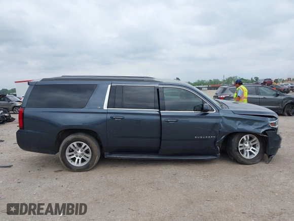 2020 Chevrolet Suburban LT z VIN 1GNSKHKC2LR259315, wystawiony jako IAAI lot #42129791 z przebiegiem 72 979 mil mil oraz . Historia ofert i sprzedaży dostępna na DreamBid. Obrazek 13.