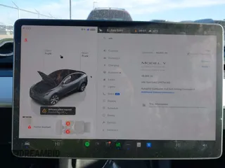 2023 Tesla Model Y Long Range with VIN 7SAYGAEEXPF714760, listed as a IAAI auction lot 41748398 with 49,802 mi miles and . Bid and sale history available at DreamBid. Image 7.