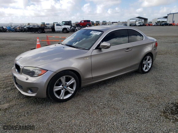 2013 BMW 1 Series 128i with VIN WBAUP9C59DVS94870, listed as a Copart auction lot 80990614 with 111,331 mi miles and Salvage Title. Bid and sale history available at carsss.com. Image 1.