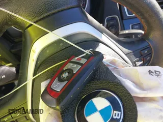 2015 BMW 2 Series 228i with VIN WBA1K5C57FV473826, listed as a IAAI auction lot 41866820 with 130,823 mi miles. Bid and sale history available at carsss.com. Image 11.