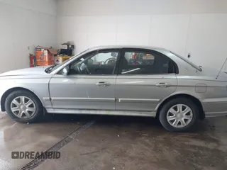 2002 Hyundai Sonata with VIN KMHWF25S42A574561, listed as a IAAI auction lot 41613838 with 141,808 mi miles. Bid and sale history available at carsss.com. Image 15.