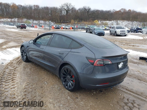 2023 Tesla Model 3 Performance with VIN 5YJ3E1EC6PF590739, listed as a IAAI auction lot 40919165 with 20,474 mi miles. Bid and sale history available at carsss.com. Image 3.