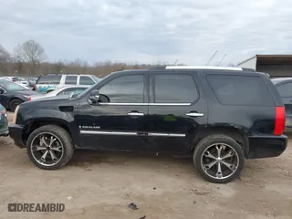 2009 Cadillac Escalade with VIN 1GYFK13269R147563, listed as a IAAI auction lot 41462689 with 210,095 mi miles. Bid and sale history available at carsss.com. Image 14.