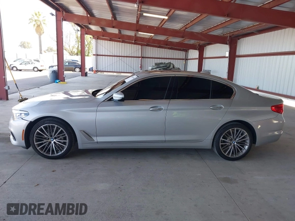 2018 BMW 5 Series 530i with VIN WBAJA5C50JWA37179, listed as a IAAI auction lot 42003204 with 74,333 mi miles and . Bid and sale history available at carsss.com. Image 14.