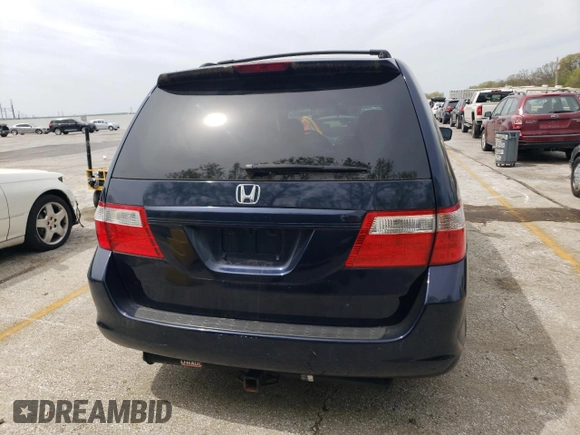 2007 Honda Odyssey EX with VIN 5FNRL38477B101619, listed as a Copart auction lot 54134505 with 129,468 mi miles and Clean title. Bid and sale history available at DreamBid. Image 6.