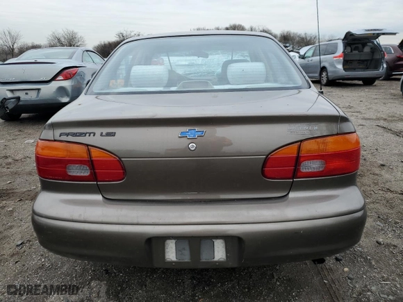2000 Chevrolet Prizm with VIN 1Y1SK5283YZ425556, listed as a Copart auction lot 83388554 with 104,580 mi miles and Salvage Title. Bid and sale history available at carsss.com. Image 6.