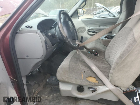 1998 Ford F-150 with VIN 1FTZX1727WNB55284, listed as a Copart auction lot 51781465 with 258,600 mi miles and Salvage title. Bid and sale history available at DreamBid. Image 7.