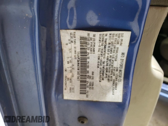 2005 Ford Focus SE with VIN 1FAHP36N65W187161, listed as a Copart auction lot 52024045 with 261,194 mi miles and Salvage Title. Bid and sale history available at carsss.com. Image 13.