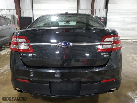 2015 Ford Taurus SEL with VIN 1FAHP2H85FG172647, listed as a Copart auction lot 49309175 with 99,789 mi miles and Salvage Title. Bid and sale history available at carsss.com. Image 6.