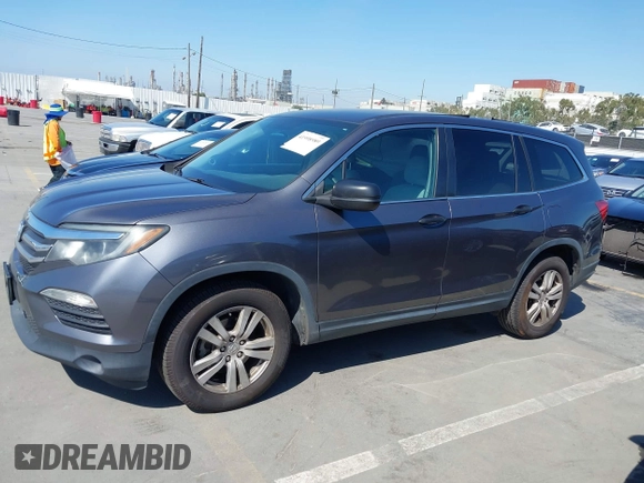 2016 Honda Pilot LX with VIN 5FNYF5H1XGB032851, listed as a IAAI auction lot 41998989 with 68,882 mi miles and . Bid and sale history available at DreamBid. Image 14.