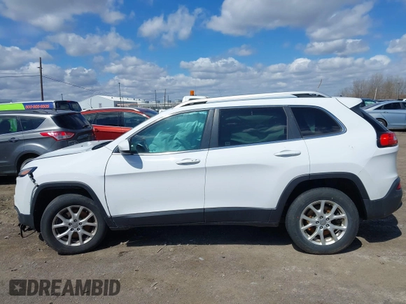 2014 Jeep Cherokee Latitude with VIN 1C4PJMCS8EW192482, listed as a IAAI auction lot 41994546 with 116,839 mi miles and . Bid and sale history available at carsss.com. Image 14.