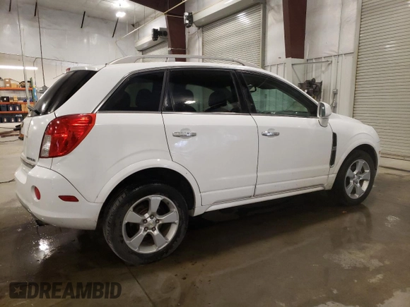 2014 Chevrolet Captiva Sport LT with VIN 3GNAL3EK4ES661268, listed as a Copart auction lot 74895224 with 128,513 mi miles and Salvage Title. Bid and sale history available at DreamBid. Image 3.