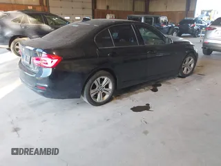 2016 BMW 3 Series 328i xDrive with VIN WBA8E3G51GNU02983, listed as a IAAI auction lot 40755586 with 75,082 mi miles. Bid and sale history available at carsss.com. Image 4.