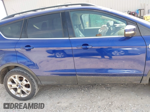 2013 Ford Escape SEL with VIN 1FMCU0H94DUC84666, listed as a IAAI auction lot 42001644 with 165,269 mi miles. Bid and sale history available at carsss.com. Image 13.